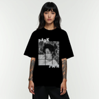 Person wearing a black t-shirt with Park Jimin of Bts graphic design on a white background