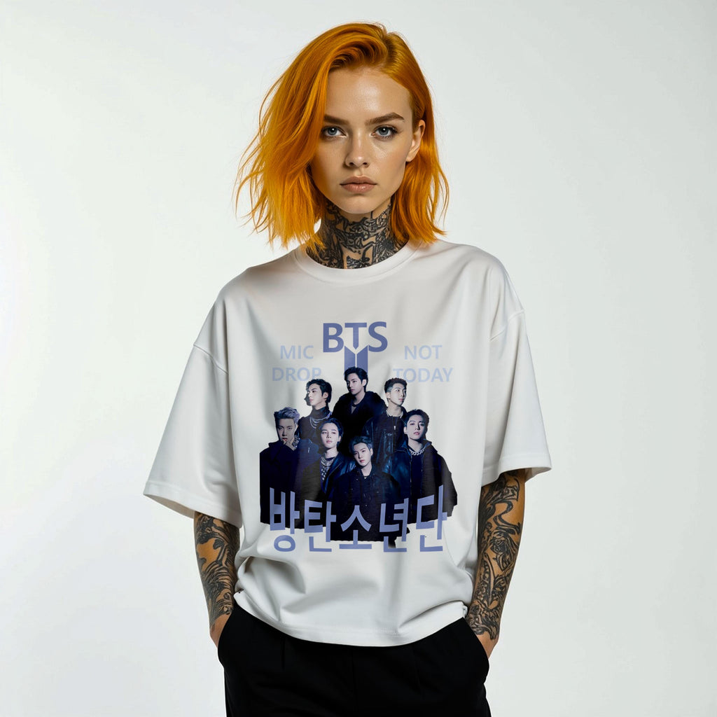 Person wearing a white t-shirt with BTS graphic and text